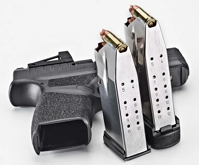 Semi-automatic handgun with two loaded magazines